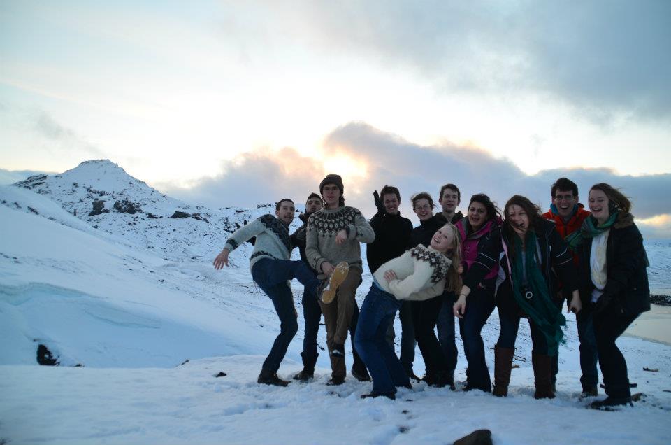 university of iowa students wearing traditional icelandic sweaters out on a glacier in iceland